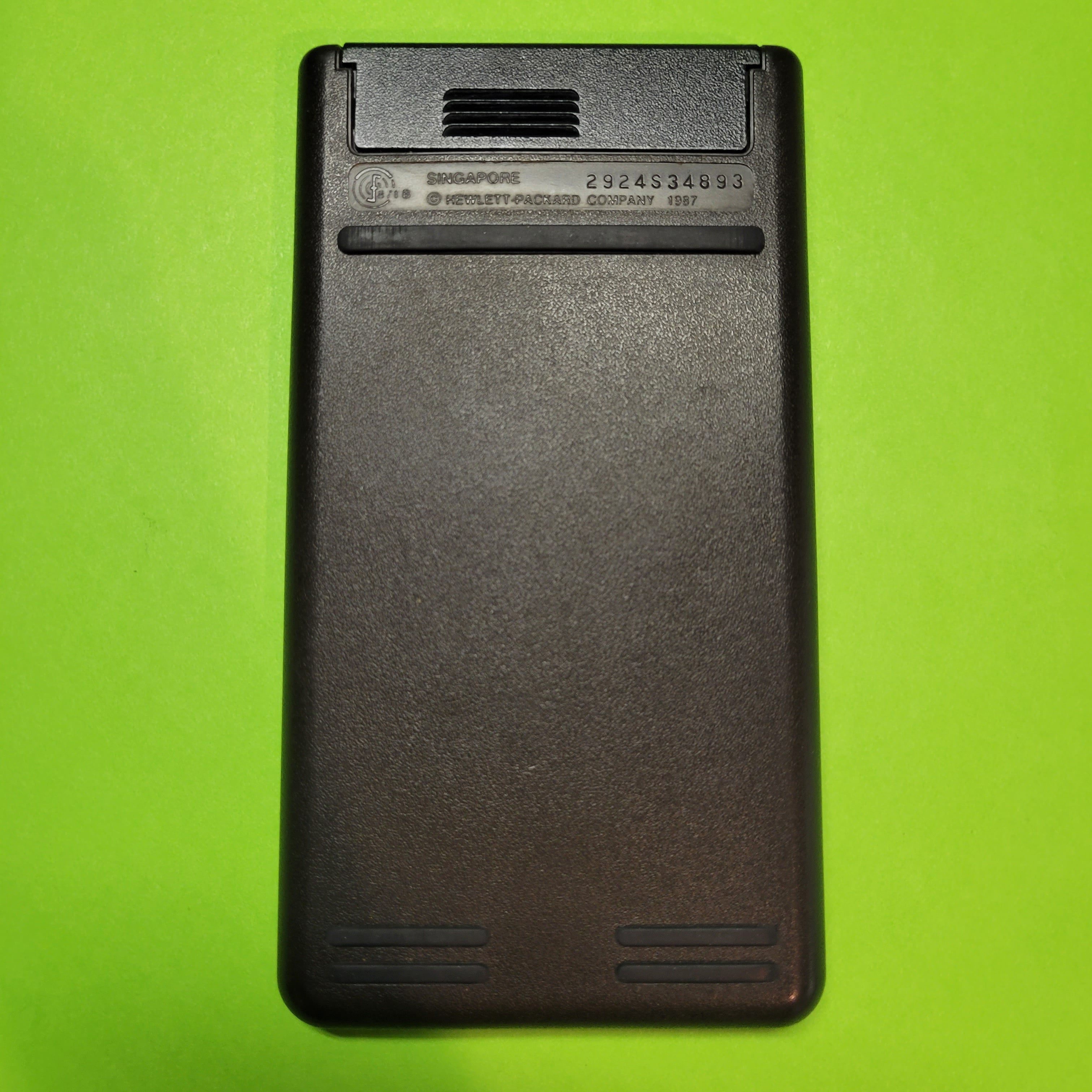 An image of the back of a HP 42s RPN Scientific Calculator